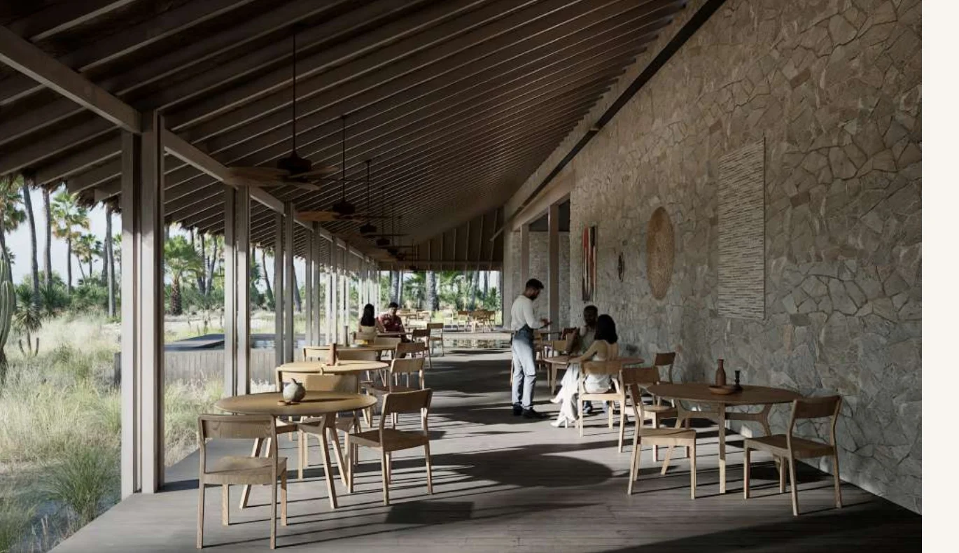 Restaurante — salão de refeições com mesas dispostas junto à vegetação